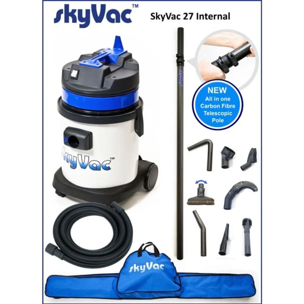Vacuum cleaner with various attachments and accessories displayed prominently.