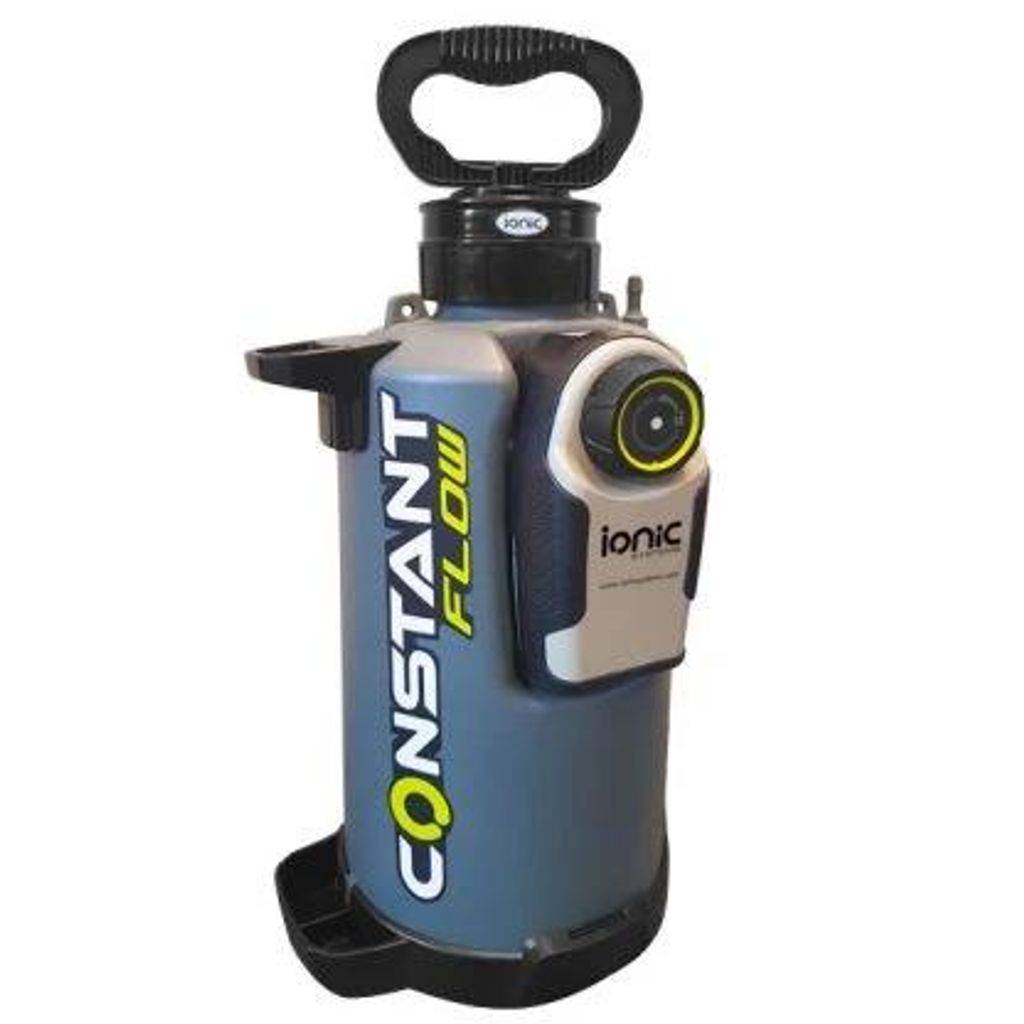A portable spray device with a handle and control dial.