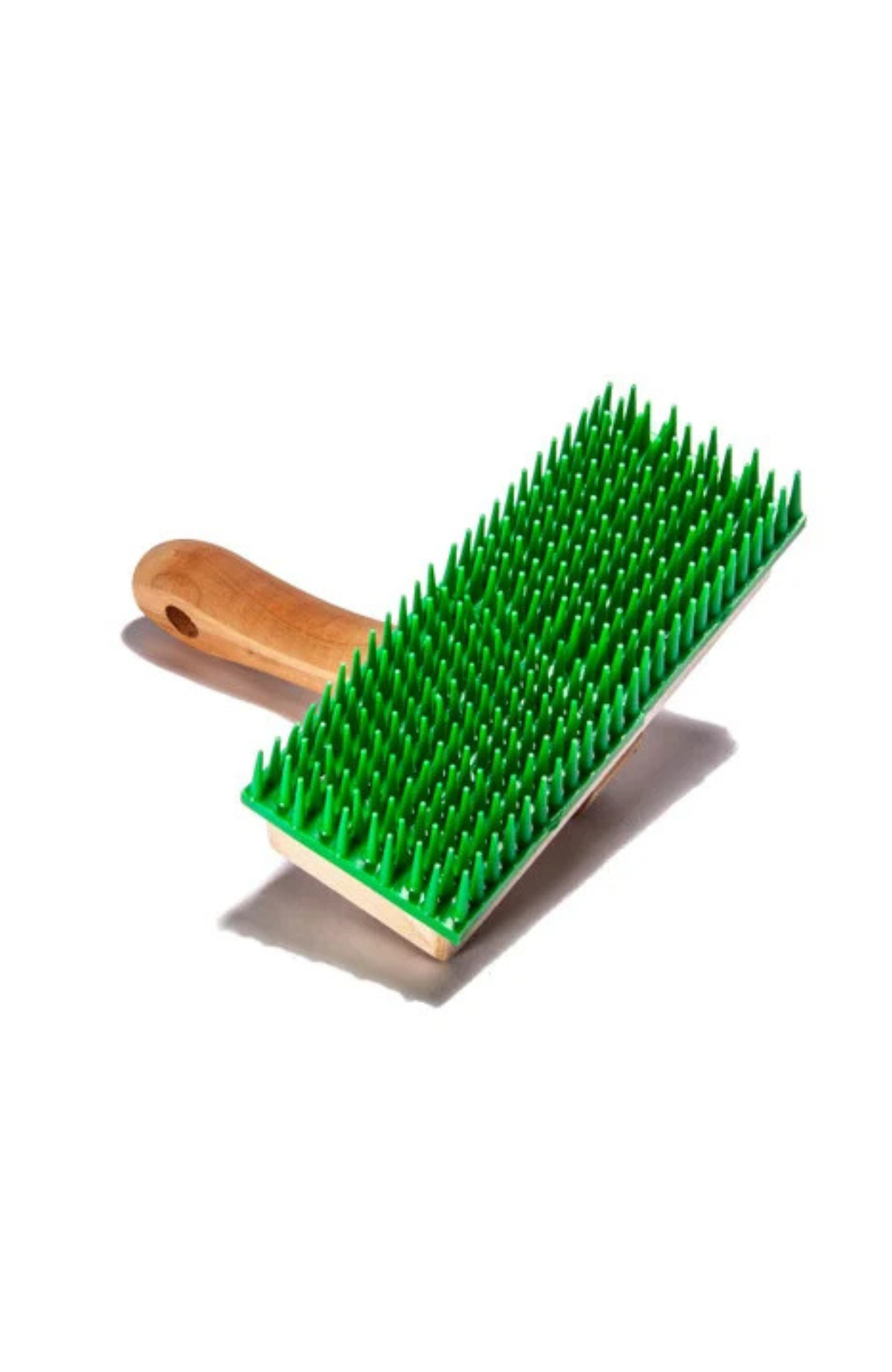 Braun Brush R9 handheld carpet comb brush with 2.5" x 6" face, hardwood handle, and 3/4" molded polypropylene teeth for lifting carpet pile.