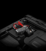 NOCO Boost GB70 jump starter connected to a vehicle battery