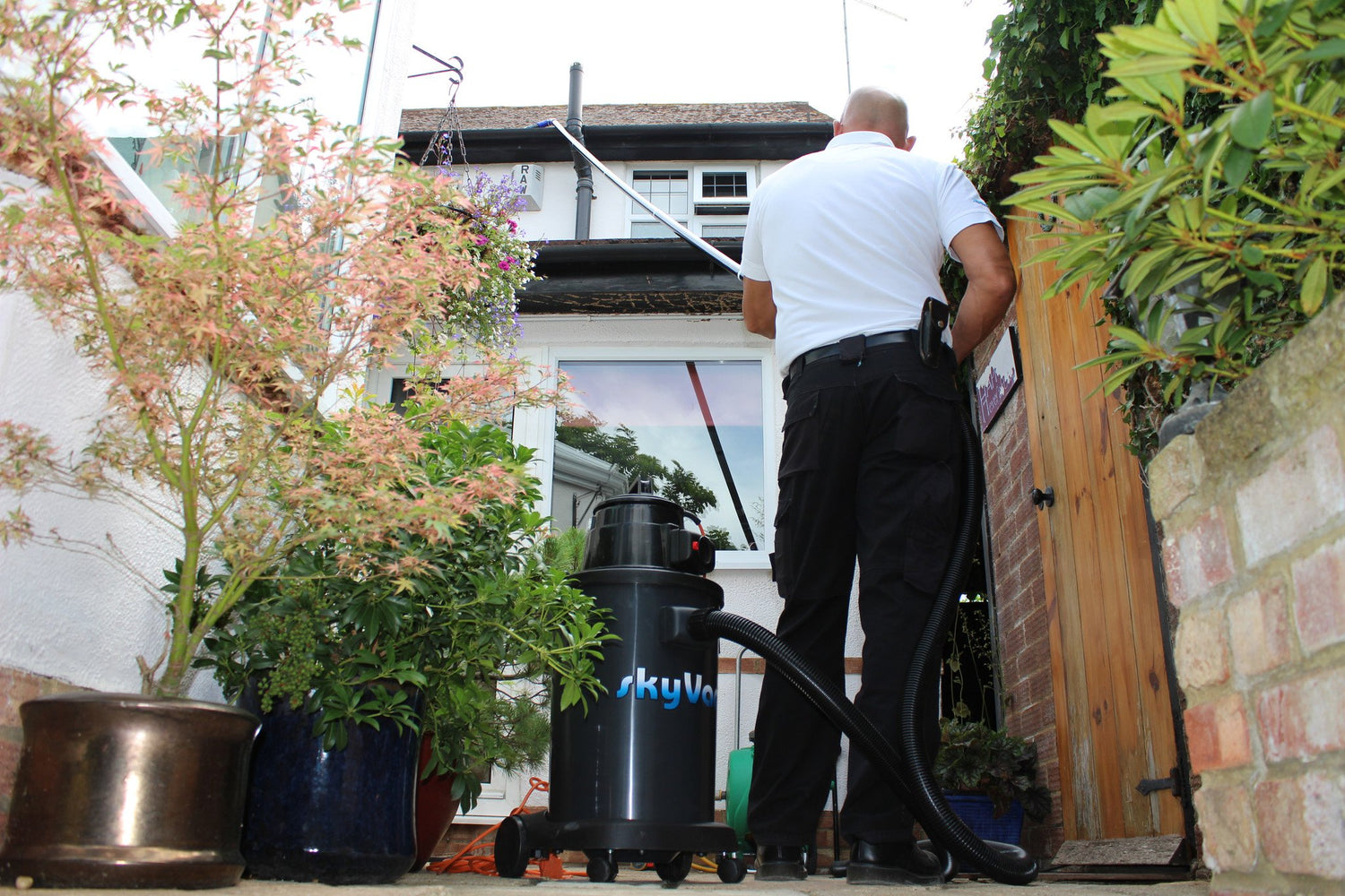 SkyVac®️ Action Photo - Gutter Cleaning Residential - Atom