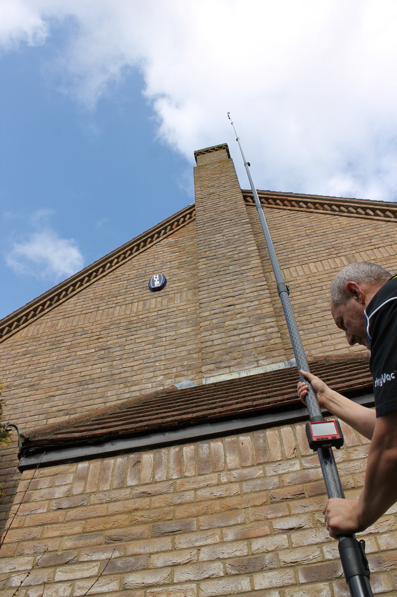 SkyVac®️ Action Photo - Telescoping SkyPole 1